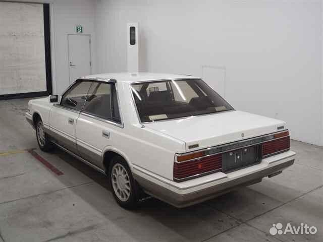 Замок багажника Nissan Laurel HC32 RB20E