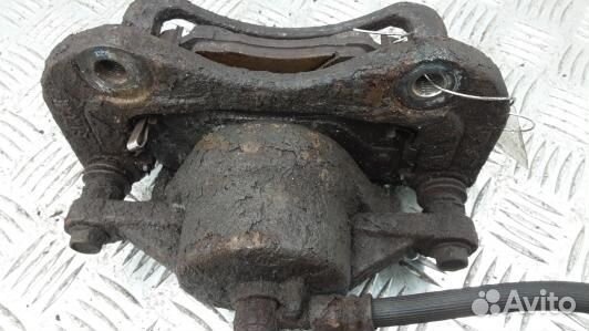 Суппорт тормозной передний левый KIA sportage 2 (1