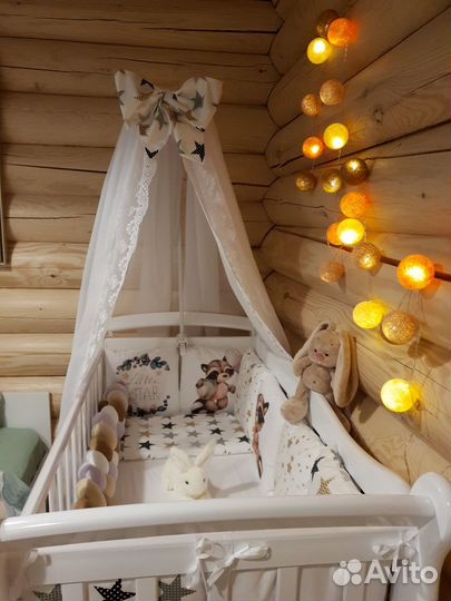 Детская кроватка с маятником
