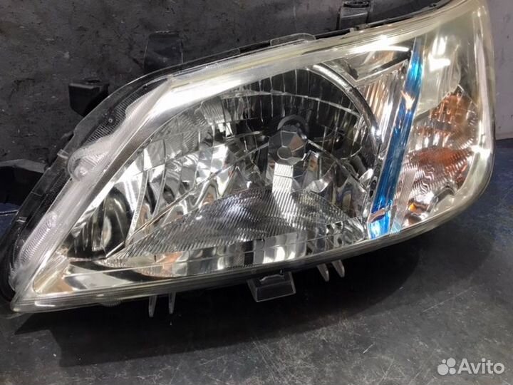 Фара ксенон левая Subaru Exiga Y10