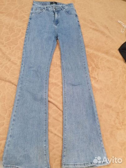 Джинсы клеш