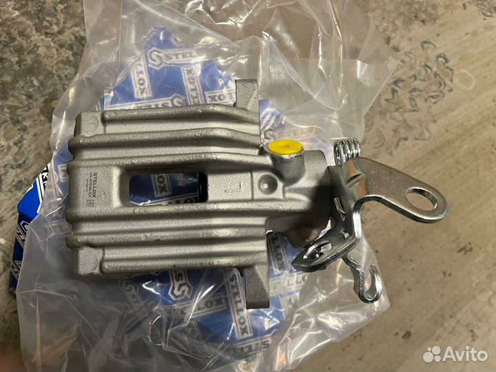 Суппорт тормозной задний левый