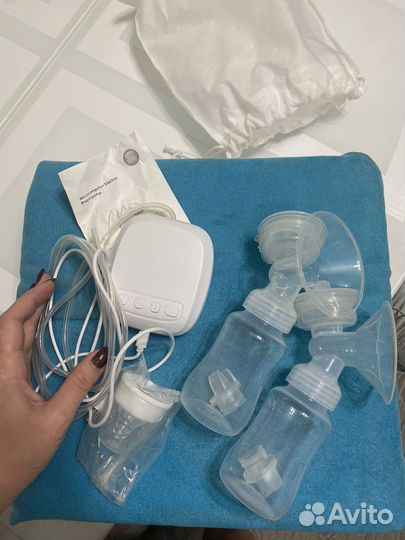 Молокоотсос электрический новый