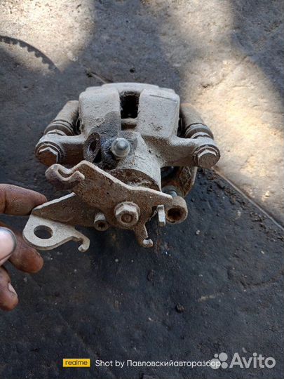 Суппорт тормозной задний правый Renault Fluence