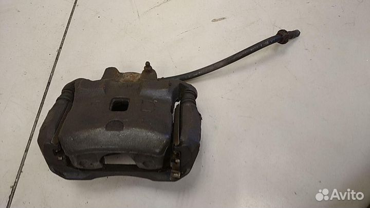 Суппорт передний левый Nissan Teana