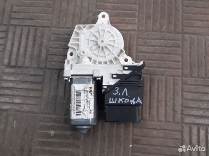 Моторчик стеклоподъёмника з/лев Skoda Octavia A5