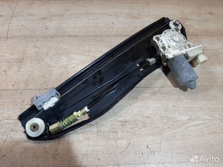 Стеклоподъемник электрический задний левый Bmw