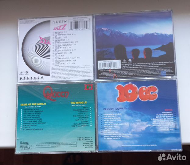 CD диски Queen, The Beatles, Rolling Stones