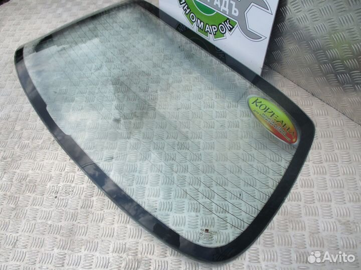 Стекло заднее Kia Spectra