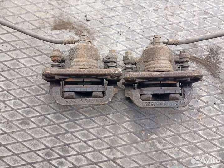 Суппорт тормозной задний Nissan Qashqai J10 06-13г