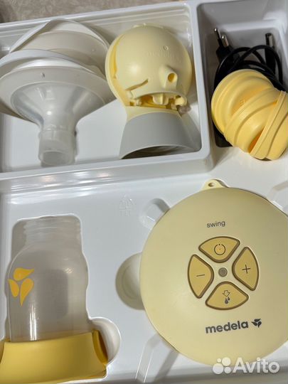 Молокоотсос medela swing