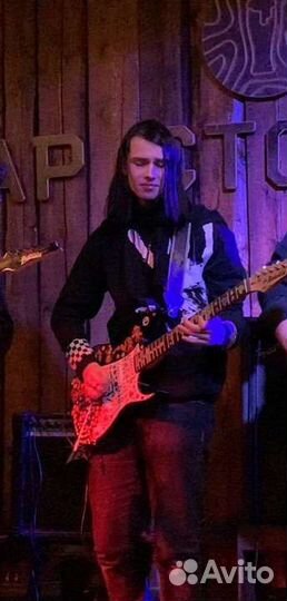 Репетитор по игре на гитаре