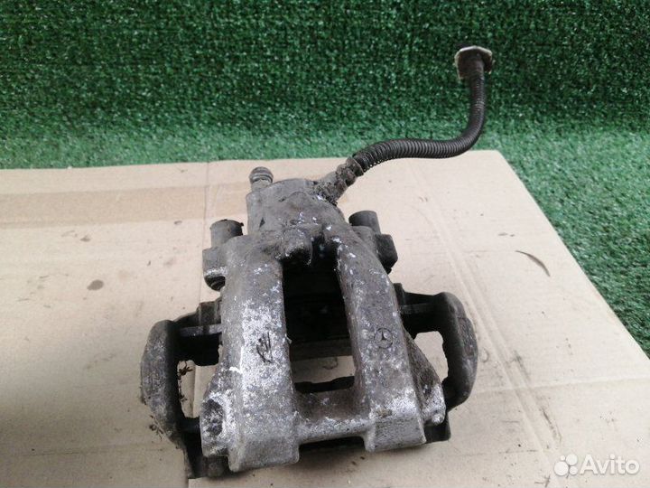 Суппорт тормозной задний левый Mercedes-Benz