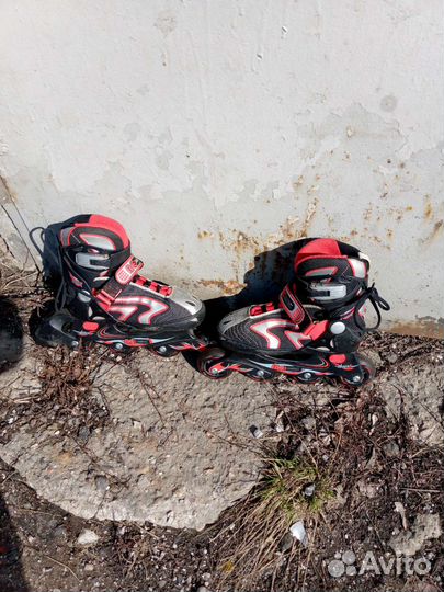 Роликовые коньки