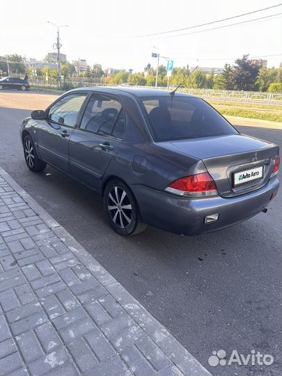 Mitsubishi Lancer 1.6 МТ, 2005, 335 577 км