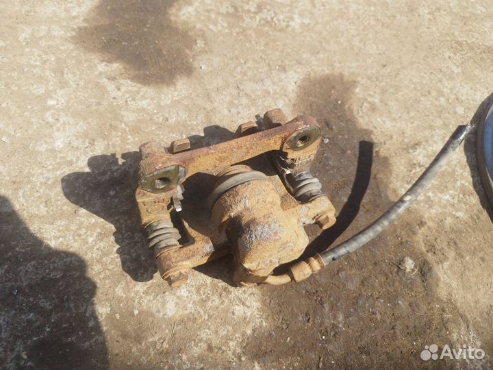 Суппорт тормозной задний правый Lifan X60 2014