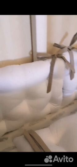 Бортики подушки в кроватку почти новые