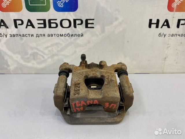 Суппорт задний правый Nissan Teana J31