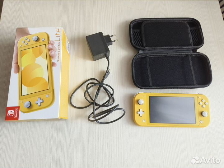 Nintendo switch lite 128 gb жёлтый + игры