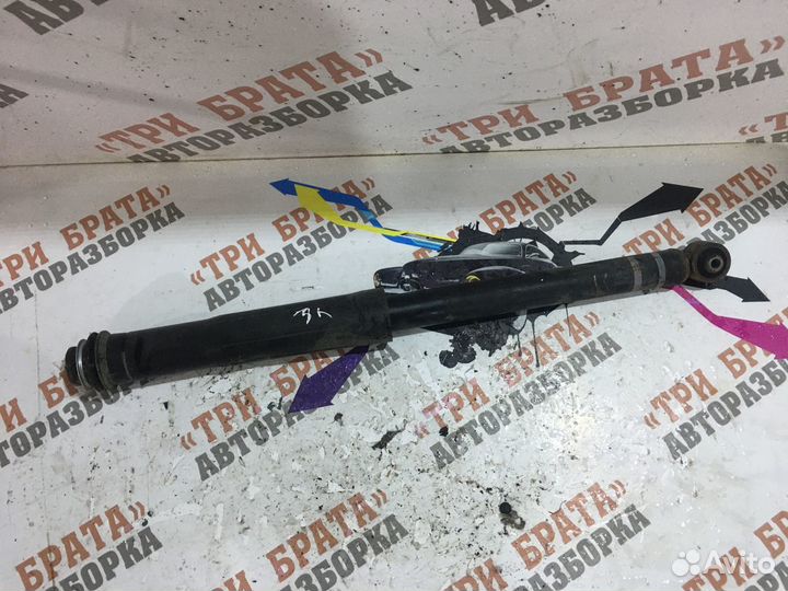 Тойота iQ Амортизатор задний левый