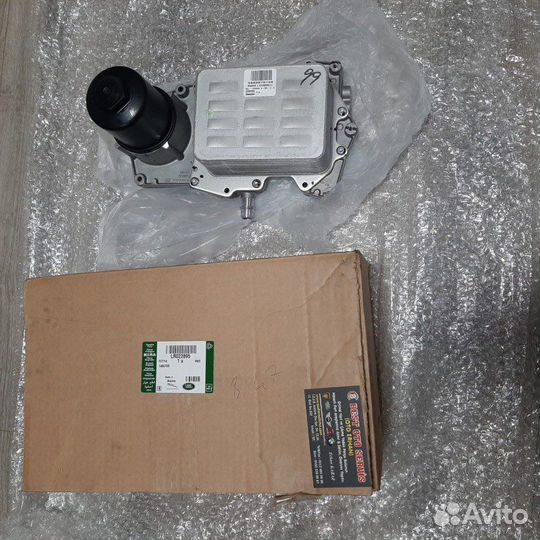 Корпус масляного фильтра Range Rover 4,4 TDV 8