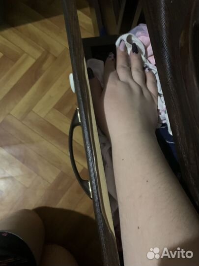 Детская кроватка с маятником