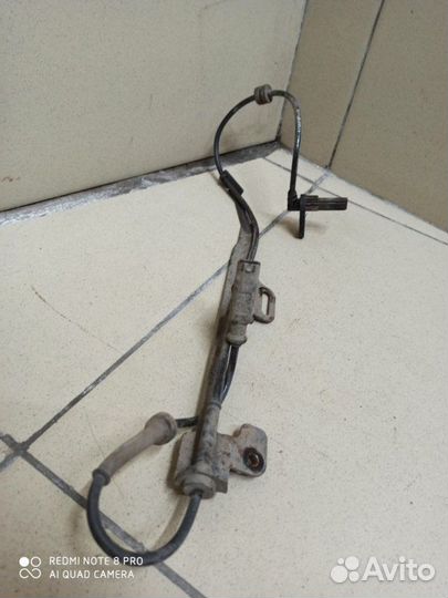 Датчик ABS задний левый Nissan Almera N16 QG15DE