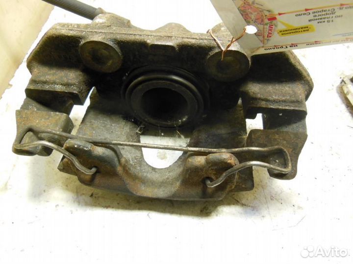 Суппорт передний левый Opel Astra F