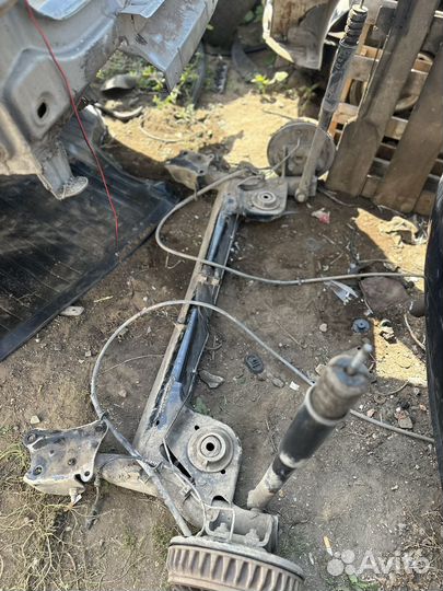 Задняя балка Лада Ларгус