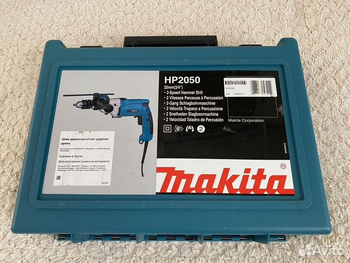 Ударная дрель Makita HP2050