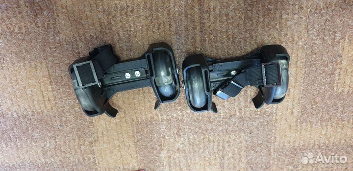 Роликовые коньки