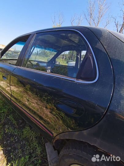 Дверь задняя левая kia clarus 2