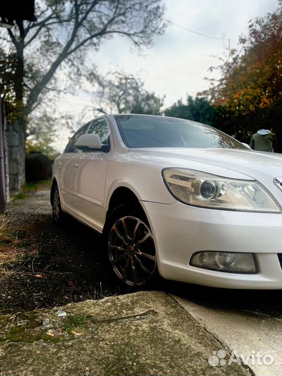 Skoda Octavia 1.6 МТ, 2012, 232 000 км