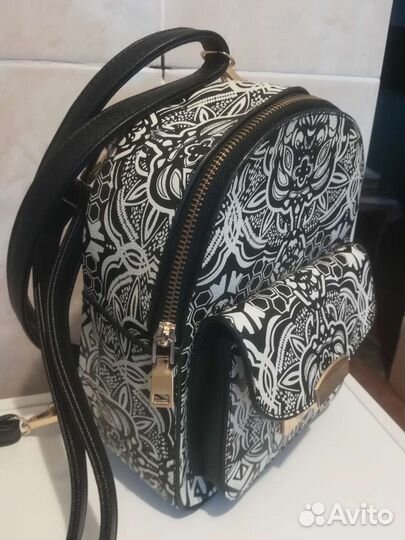 Рюкзак новый вместит