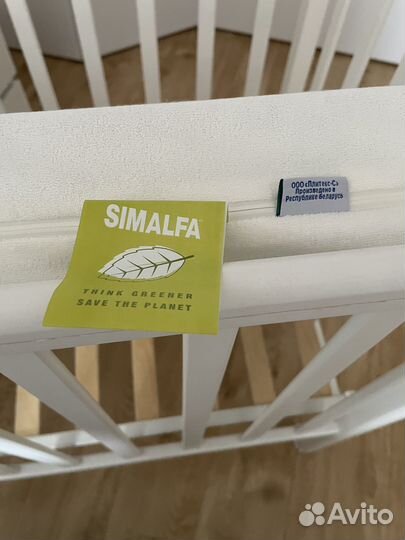 Детская кроватка с маятником и матрасом