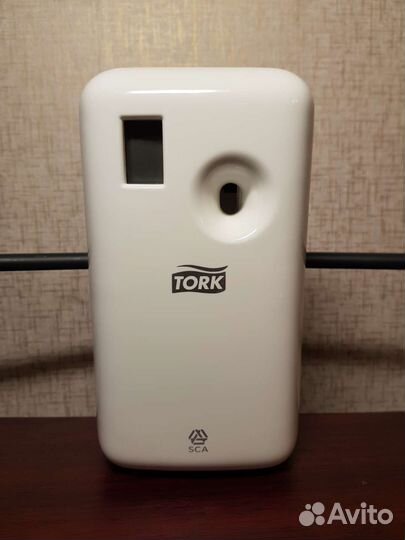 Диспенсер автоматический электронный фирмы tork