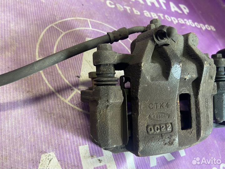 Суппорта передняя Kia Rio 2 JB G4EE 2010