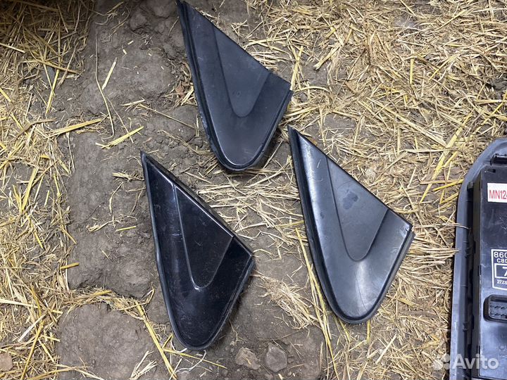 Уголок крыла внешний левый Mitsubishi Lancer 9