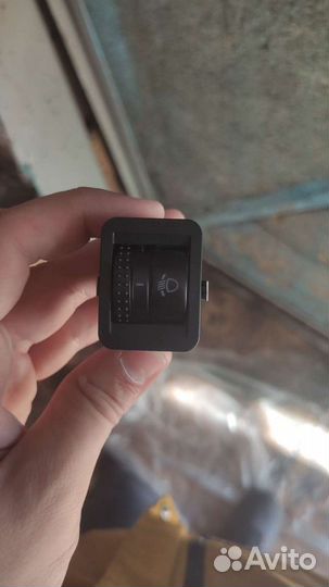 Кнопка корректора фар