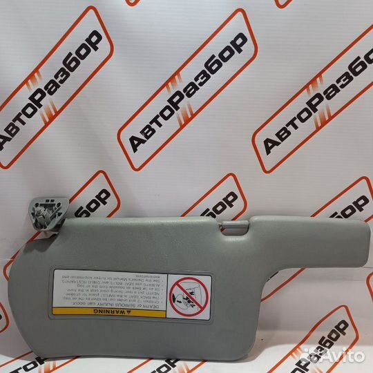 Козырек солнцезащитный правый Nissan Almera