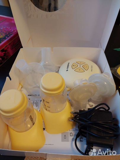 Молокоотсос электрический medela swing maxi