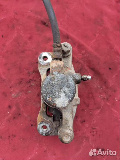 Суппорт задний Митсубиси Лансер 10 правый