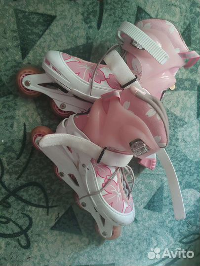 Роликовые коньки