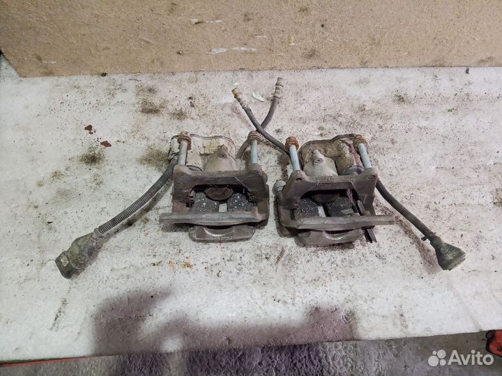 Суппорт тормозной задний левый правый Audi A8 D3