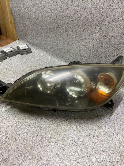 Фара левая Mazda 3 BK 2007