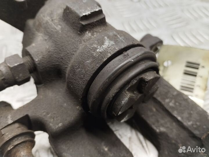 Суппорт задний правый Ford Focus 1