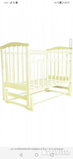 Детская кроватка с маятником