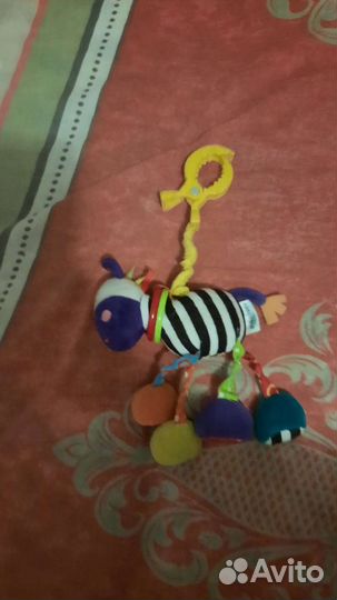 Игрушка на коляску