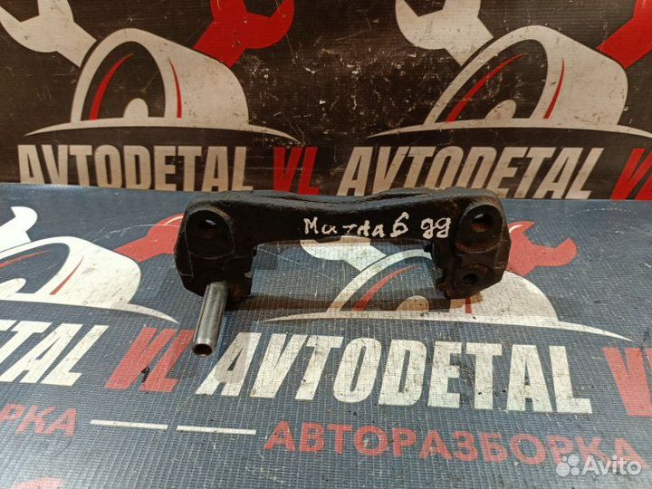 Скоба суппорта передняя левая Mazda 6 GG 2005