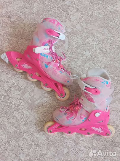 Роликовые коньки